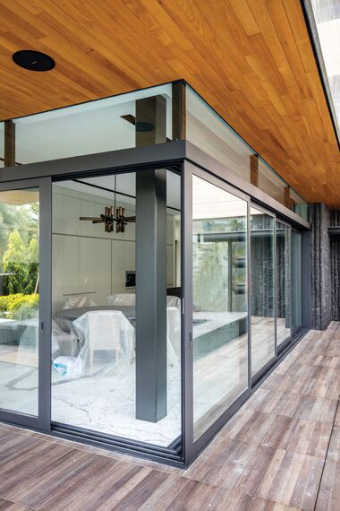 ConceptSystem 59 Windows and CP 96 Sliding & Folding - Villa 11 Sunridge Park located inSingapore