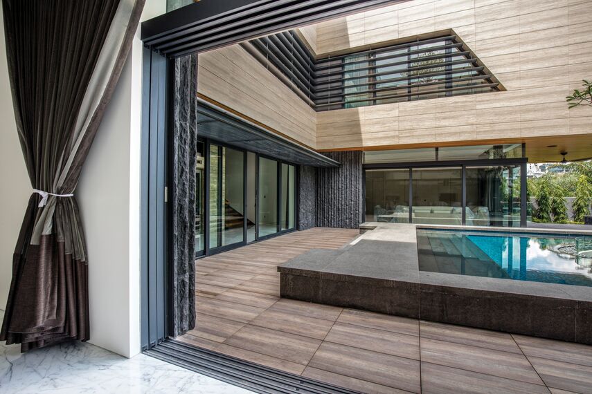 ConceptSystem 59 Windows and CP 96 Sliding & Folding - Villa 11 Sunridge Park located inSingapore