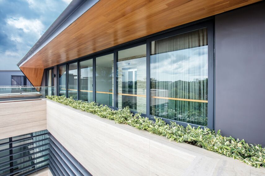 ConceptSystem 59 Windows and CP 96 Sliding & Folding - Villa 11 Sunridge Park located inSingapore