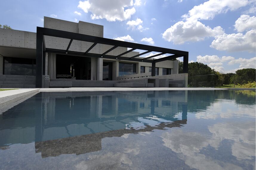 ConceptPatio 155 Sliding & Folding and CS 68 Hidden Vent Windows - Villa Concrete House located in Madrid, Spain