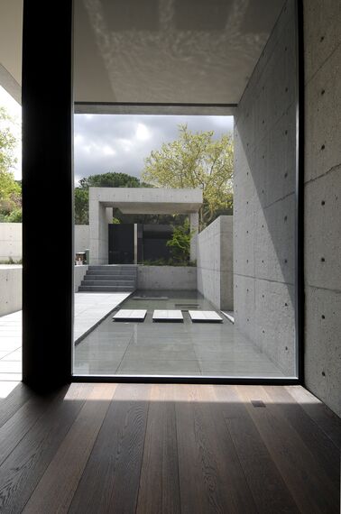 ConceptPatio 155 Sliding & Folding and CS 68 Hidden Vent Windows - Villa Concrete House located in Madrid, Spain