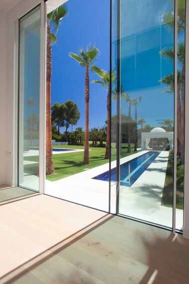 ConceptSystem 77 Doors, ConceptPatio 68 Sliding & Folding and HiFinity Sliding & Folding - Casa Las Palmeras located inSpain