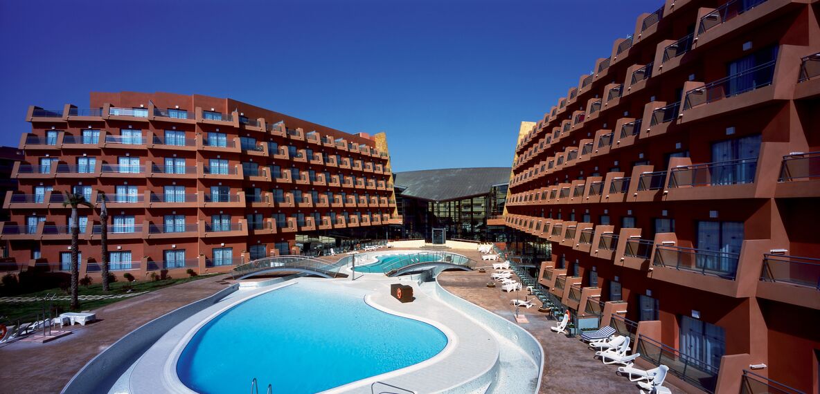 ConceptWall 50 Façades, ThermoRoof 200 Conservatories and RB 10 Complementary Systems - Swimming pool Hotel Portobello located in Roquetas de Mar (Almeria), Spain